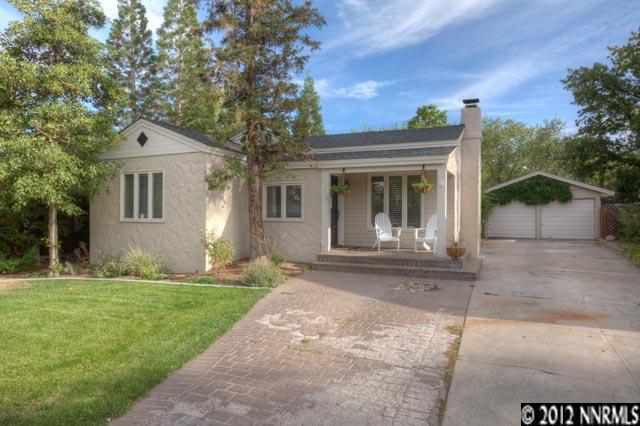 1240 Monroe Street Reno, NV 89509 - Photo 1 of 1 a front view of a house with a garden and yard