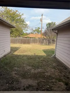 a view of a lake with a big yard