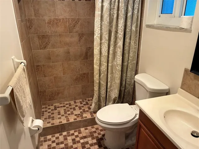 a bathroom with a sink and a toilet