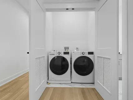 a utility room with dryer and washer