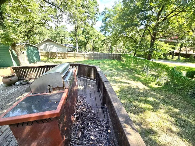 a view of yard covered with snow