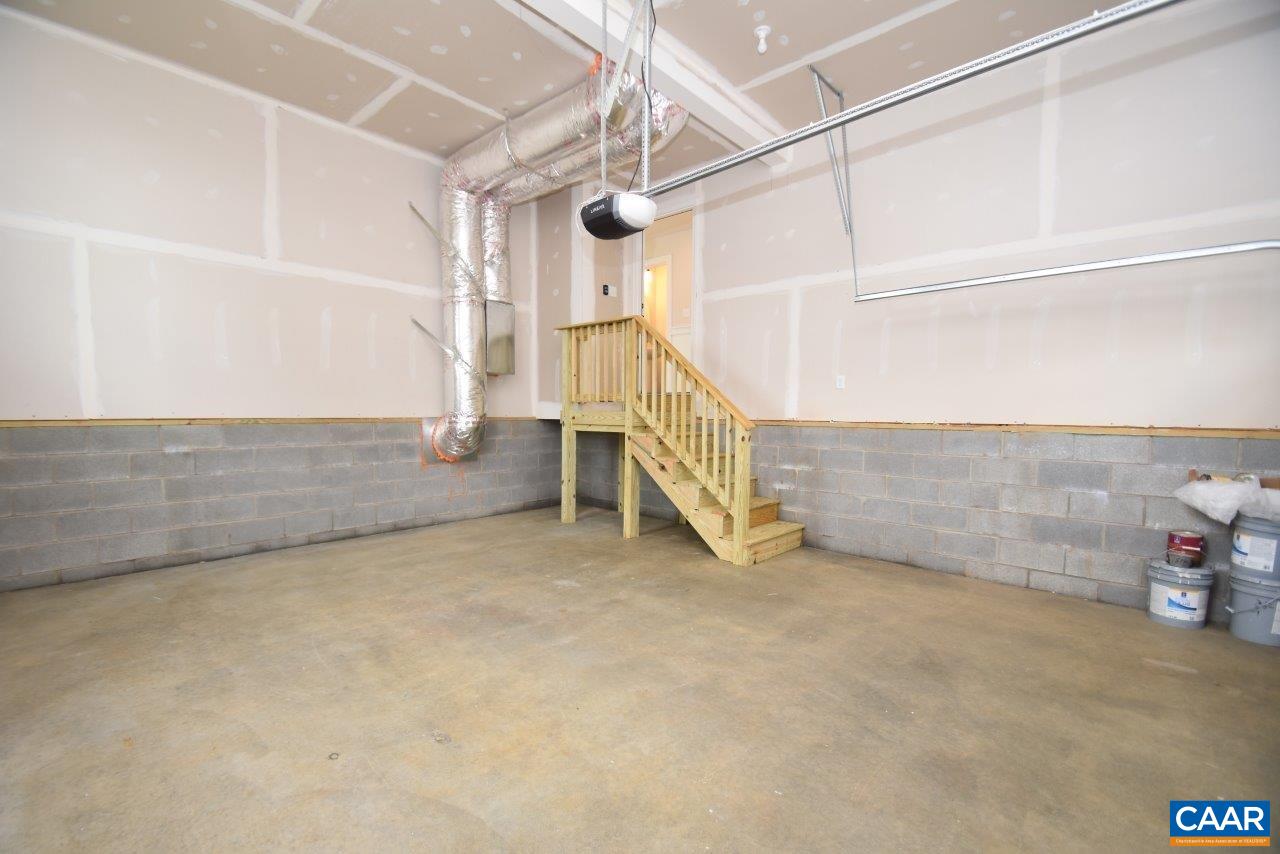 0 Bybees Church Road, Unit BE 26A Palmyra, VA 22963 - Photo 22 of 39 a view of an empty room with stairs and windows
