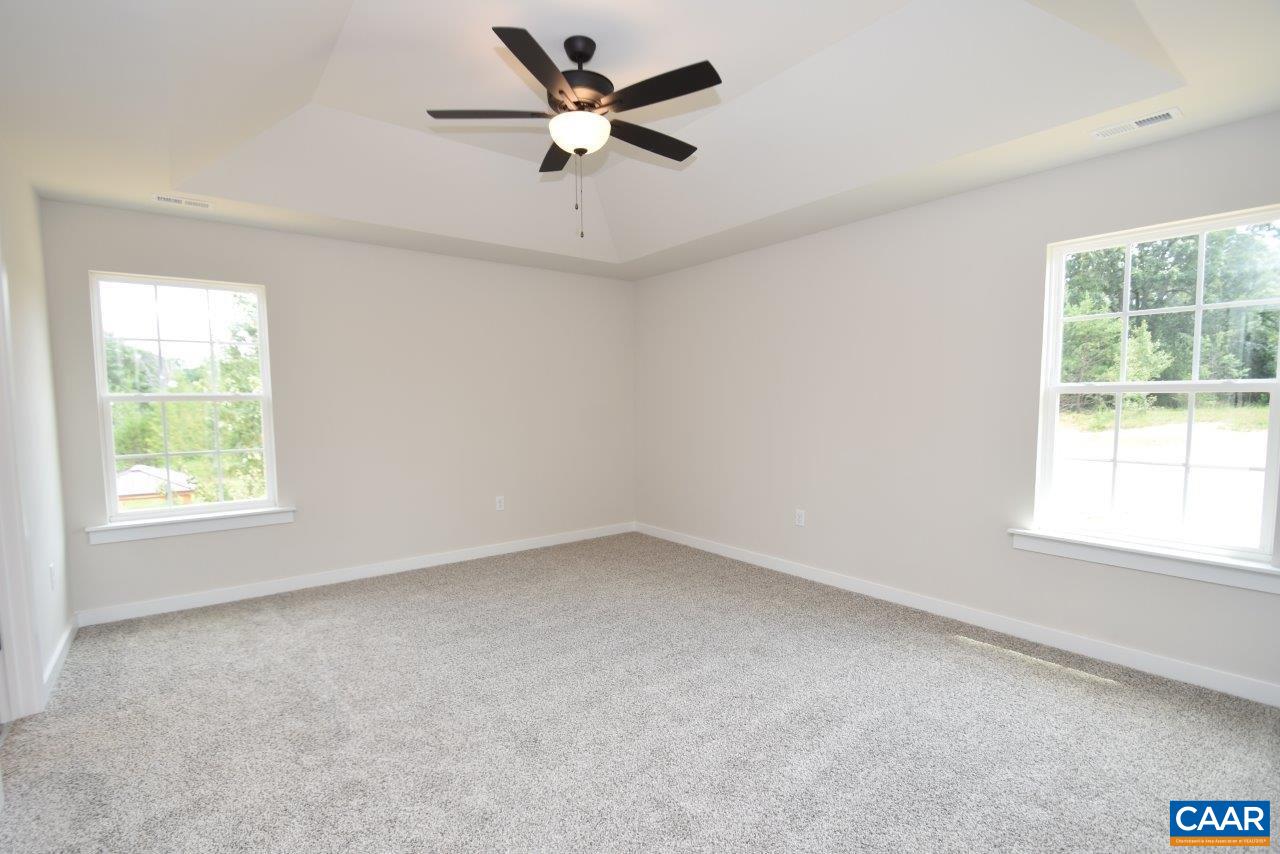 0 Bybees Church Road, Unit BE 26A Palmyra, VA 22963 - Photo 26 of 39 an empty room with a window and a fan