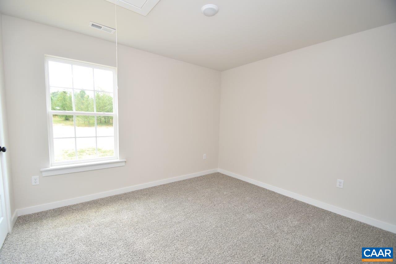 0 Bybees Church Road, Unit BE 26A Palmyra, VA 22963 - Photo 32 of 39 an empty room with a window