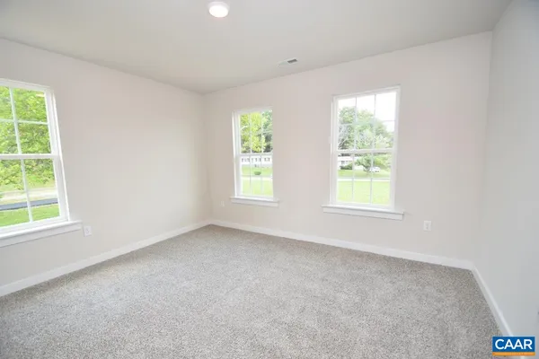 a view of a hallway with a white house