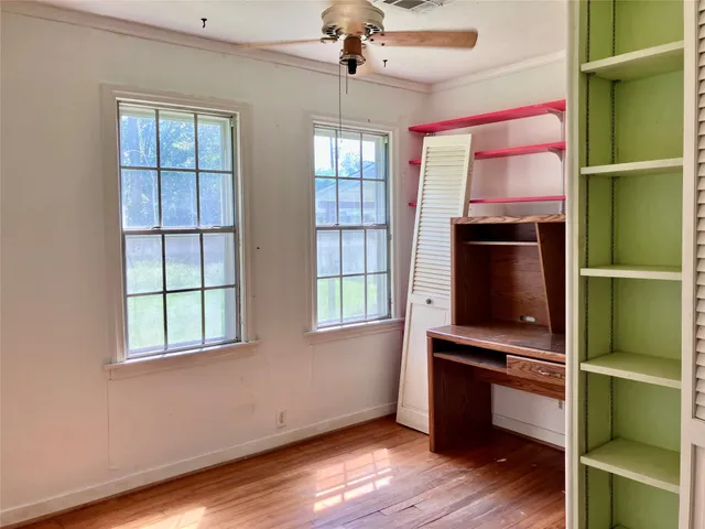 a room with furniture and a window