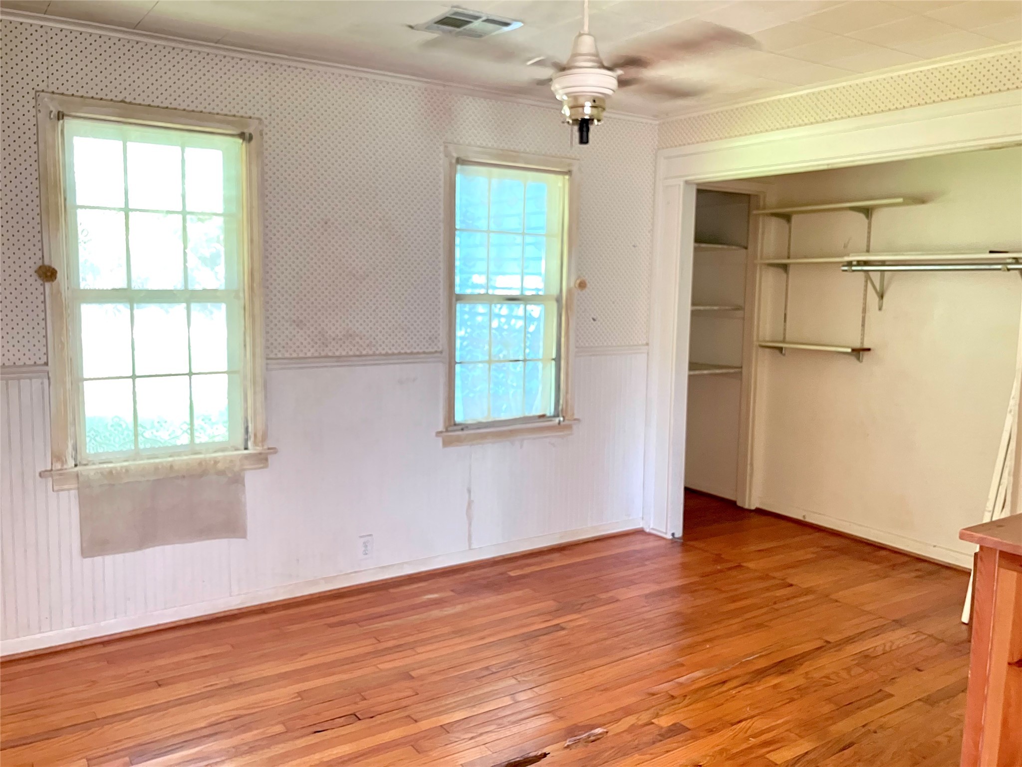 5012 Winding Way Dickinson, TX 77539 - Photo 17 of 24 a view of an empty room with wooden floor and a window