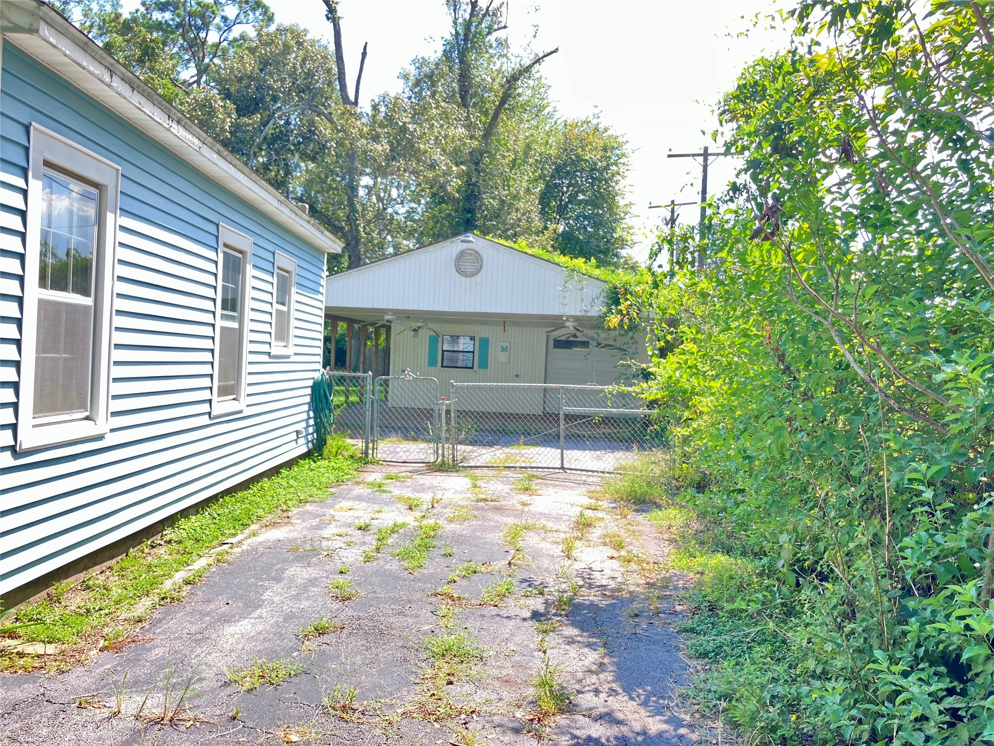 5012 Winding Way Dickinson, TX 77539 - Photo 23 of 24 a house that has a tree in front of it