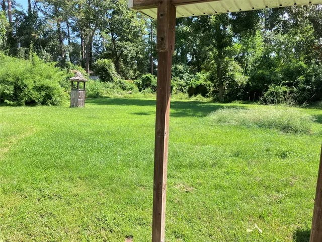 a view of backyard with green space