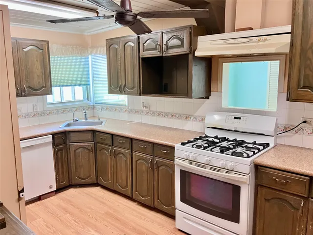 a kitchen with a stove and a microwave