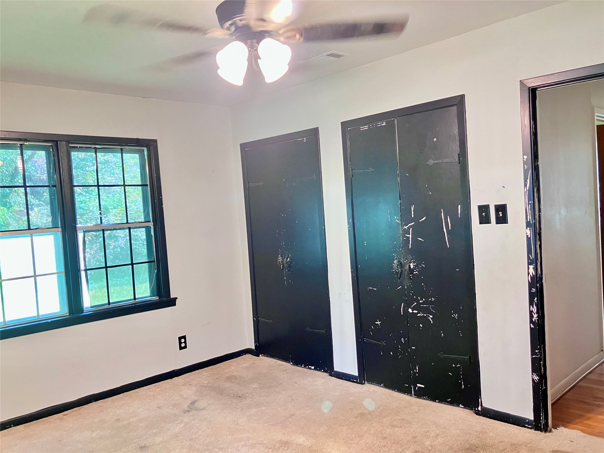 5012 Winding Way Dickinson, TX 77539 - Photo 9 of 24 a view of an empty room with a bathroom and a window