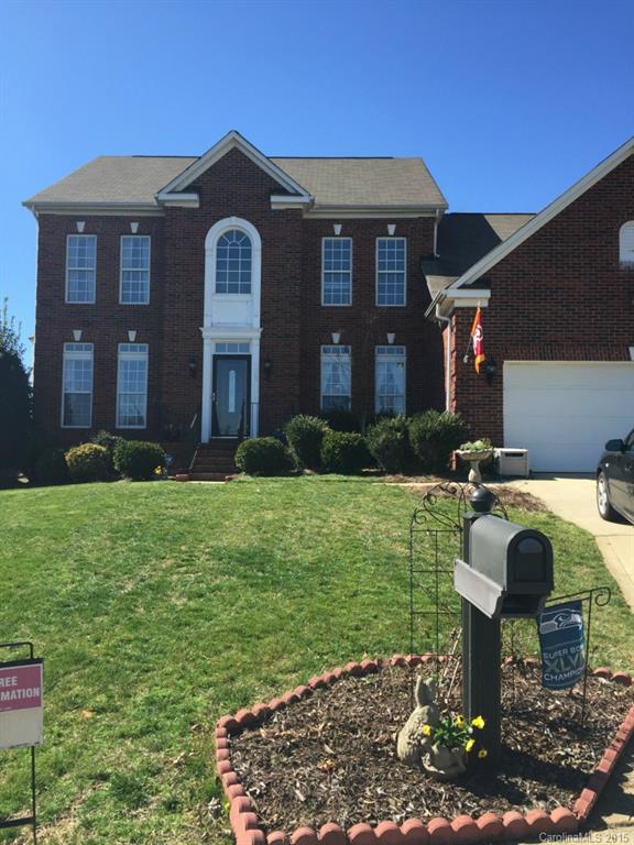 783 Knightswood Road Fort Mill, SC 29708 - Photo 1 of 17 a front view of a house with garden