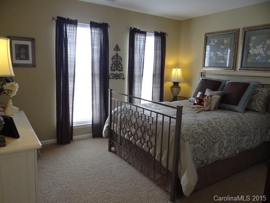 783 Knightswood Road Fort Mill, SC 29708 - Photo 13 of 17 a bed room with a bed and a window