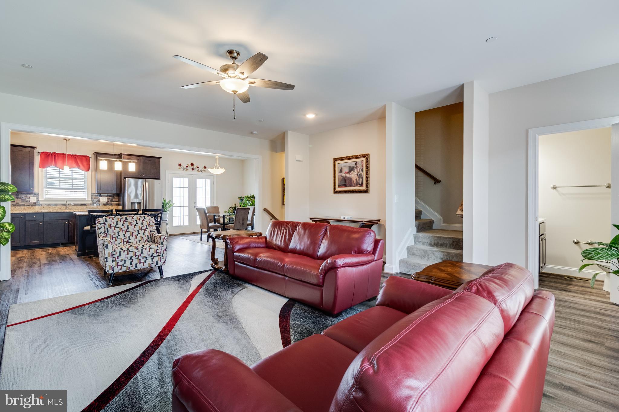 995 Rye Drive La Plata, MD 20646 - Photo 11 of 46 a living room with furniture and a chandelier
