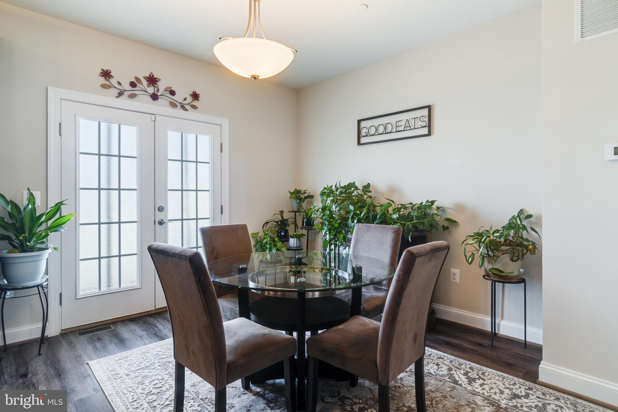 995 Rye Drive La Plata, MD 20646 - Photo 16 of 46 a view of a dining room with furniture window and wooden floor