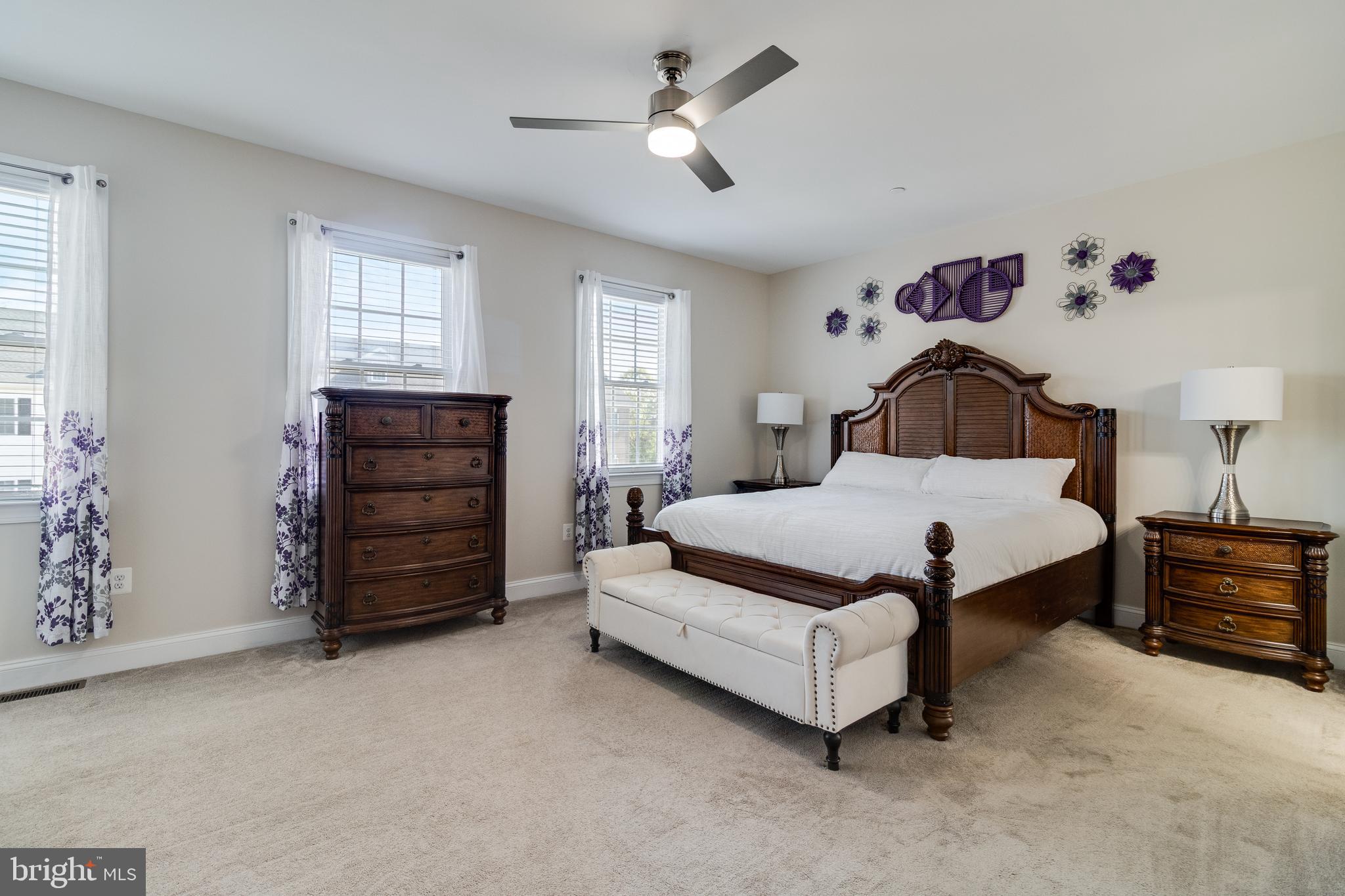 995 Rye Drive La Plata, MD 20646 - Photo 20 of 46 a bedroom with a bed and a chandelier