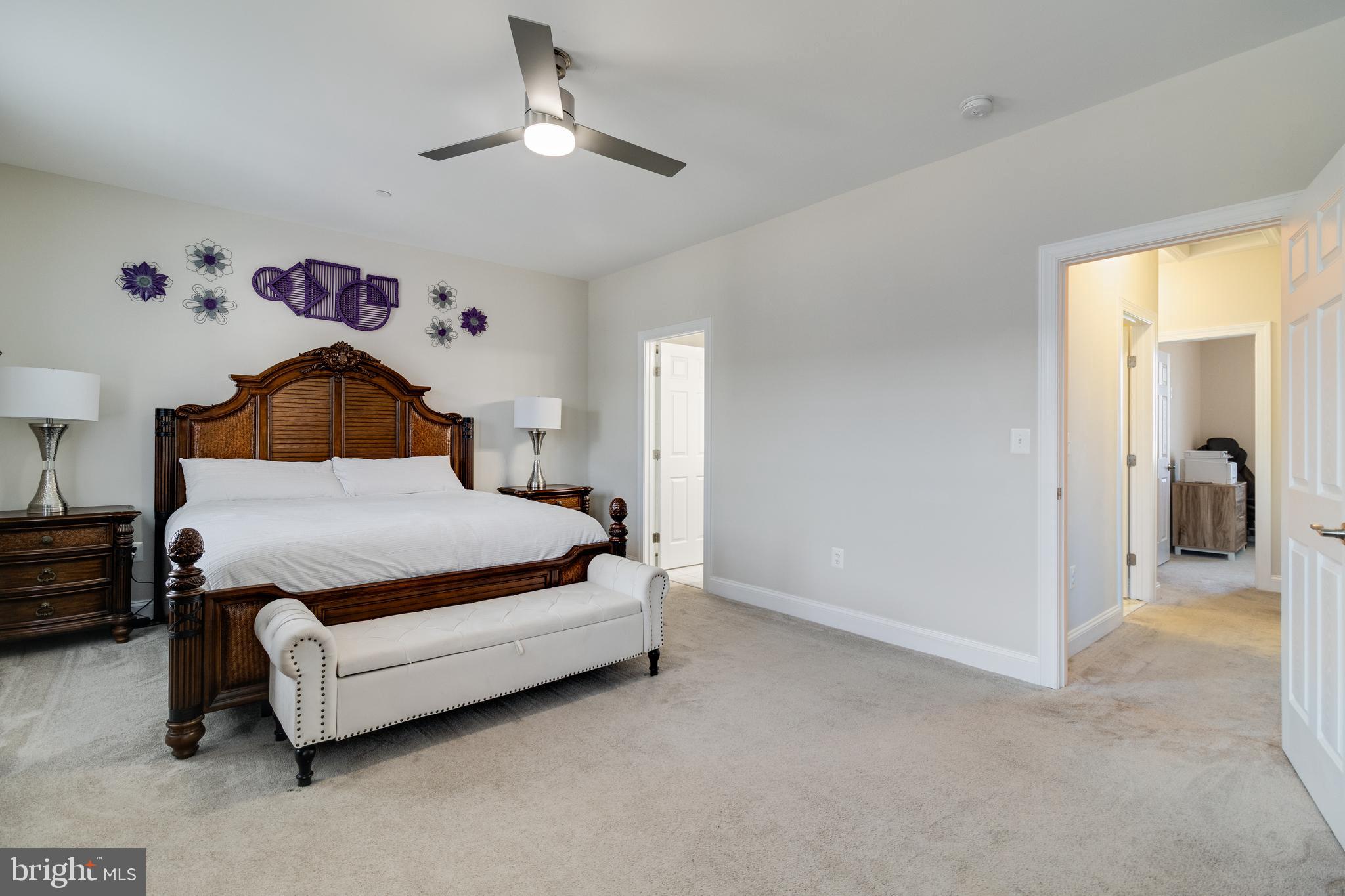 995 Rye Drive La Plata, MD 20646 - Photo 21 of 46 a bedroom with a bed and a chandelier