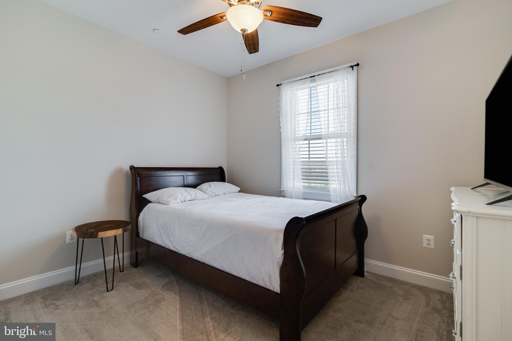 995 Rye Drive La Plata, MD 20646 - Photo 26 of 46 a bedroom with a bed and a flat screen tv