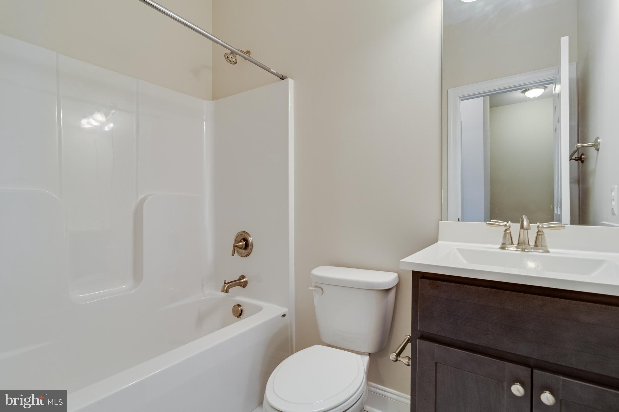 995 Rye Drive La Plata, MD 20646 - Photo 27 of 46 a bathroom with a sink a toilet and shower