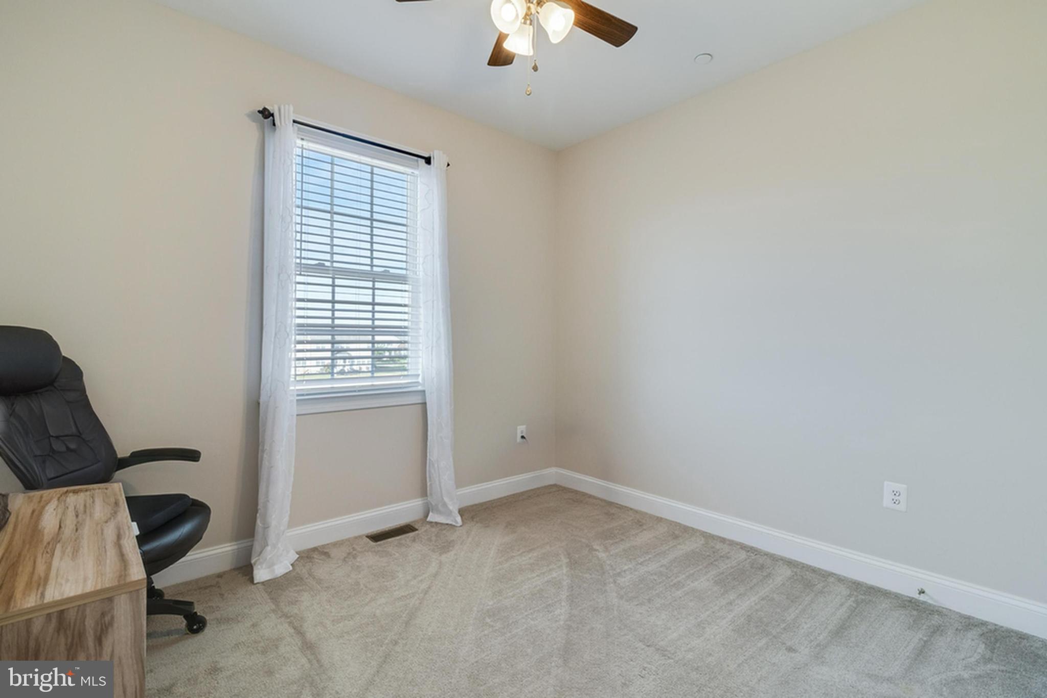 995 Rye Drive La Plata, MD 20646 - Photo 29 of 46 an empty room with fan and windows