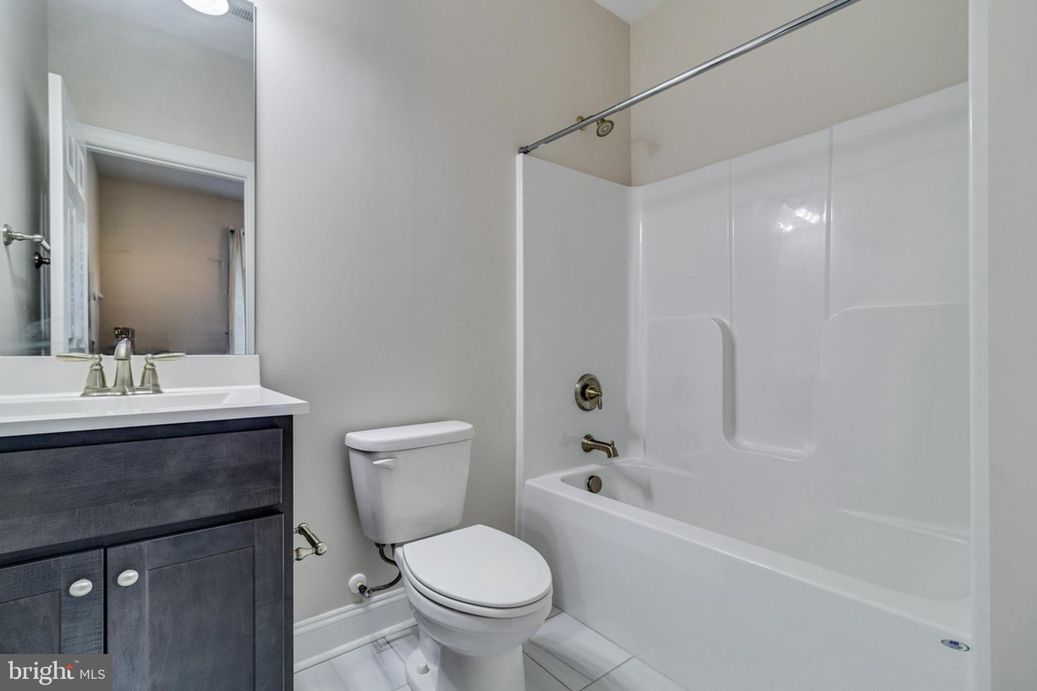 995 Rye Drive La Plata, MD 20646 - Photo 31 of 46 a bathroom with a sink toilet and shower