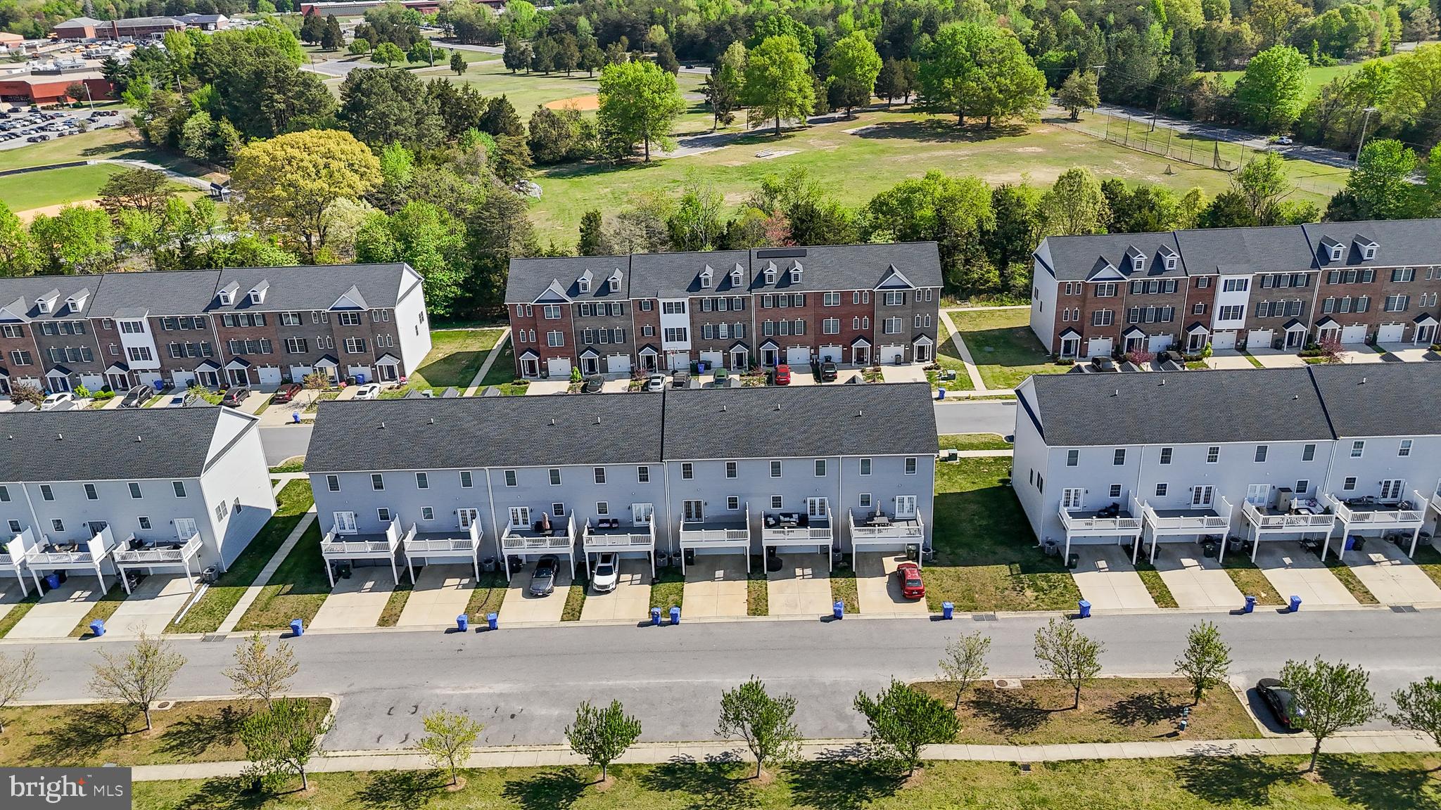 995 Rye Drive La Plata, MD 20646 - Photo 40 of 46 a swimming pool with outdoor seating and yard