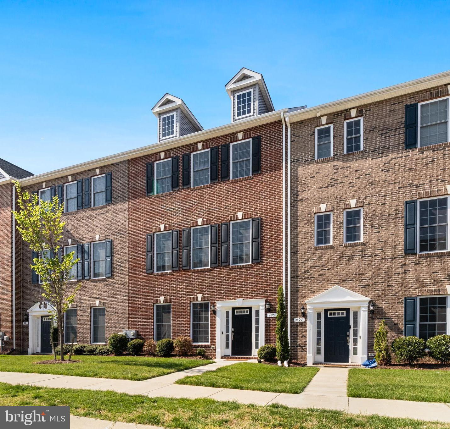995 Rye Drive La Plata, MD 20646 - Photo 4 of 46 a front view of a building with a yard