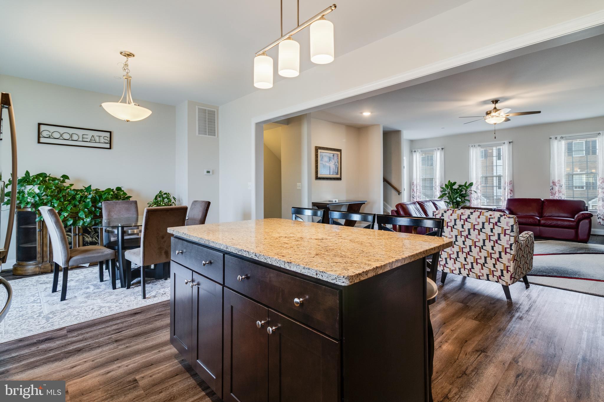 995 Rye Drive La Plata, MD 20646 - Photo 9 of 46 a view of a dining room with furniture and wooden floor