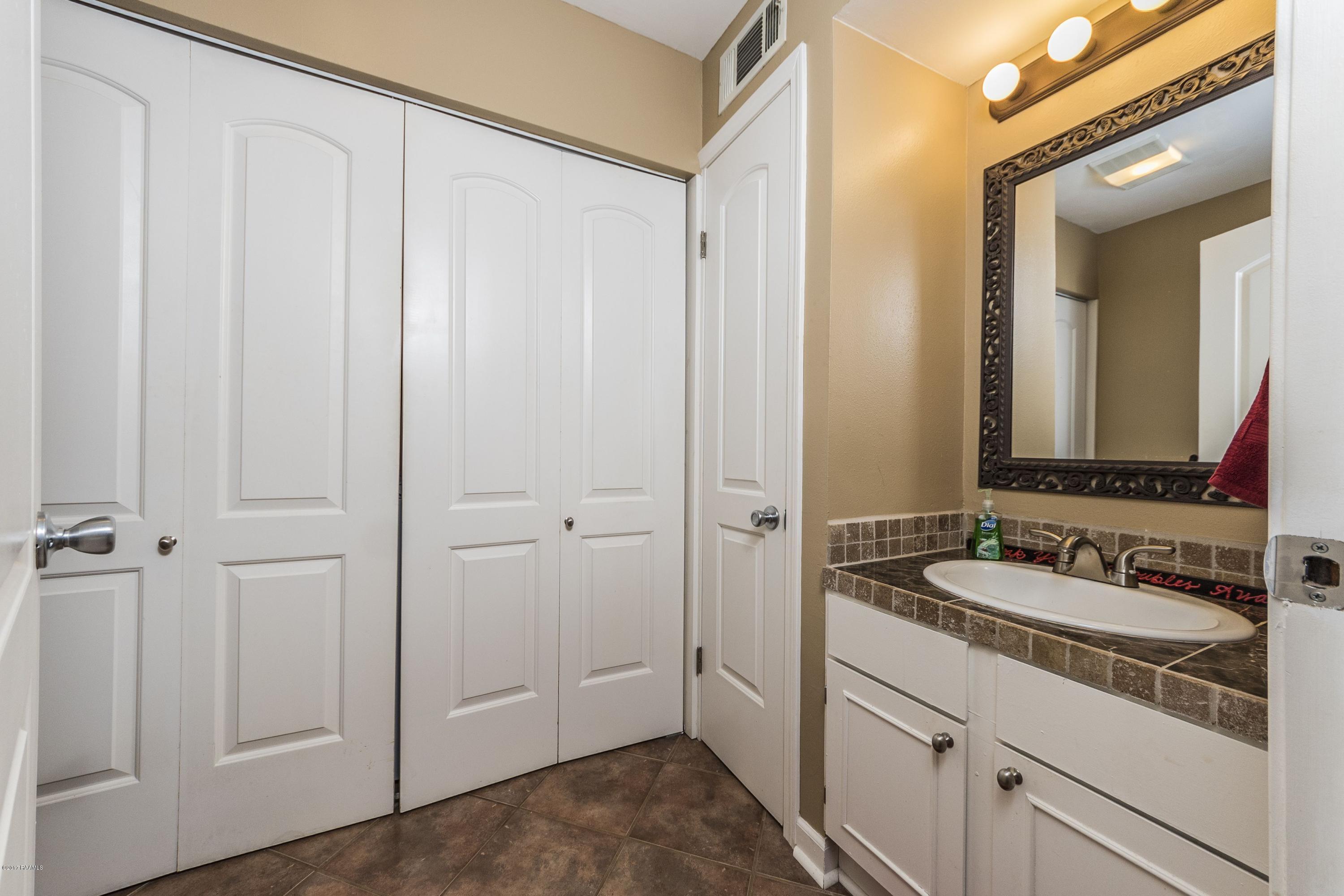201 Cougar Ridge, Unit 4 Lafayette, LA 70508 - Photo 8 of 16 14 Half Bath - Laundry 1