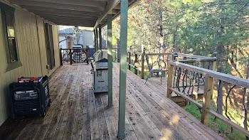 a balcony with wooden floor