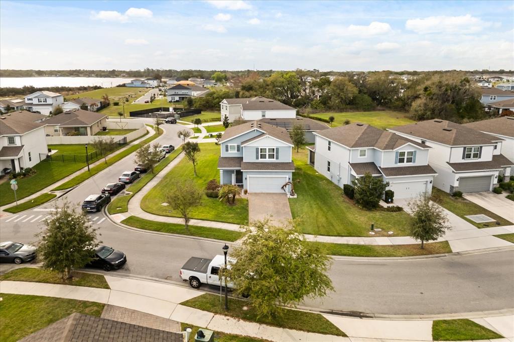 5192 Chickadee Street St. Cloud, FL 34771 - Photo 32 of 35 an aerial view of residential houses with outdoor space