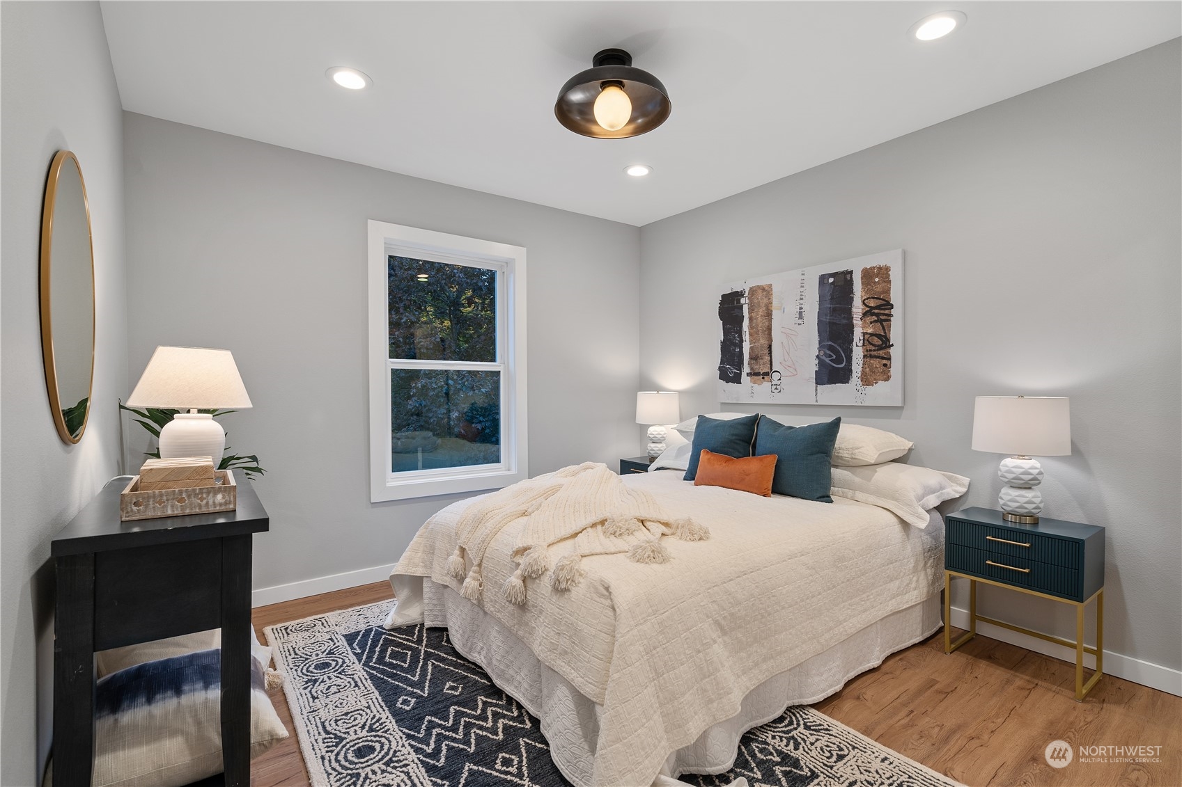 3541 Southwest 100th Street Seattle, WA 98146 - Photo 11 of 25 a bedroom with a bed and a window