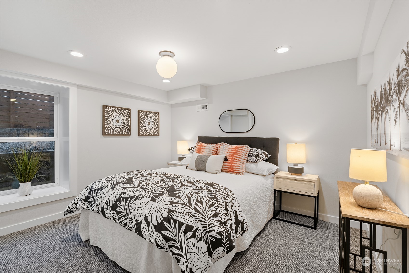 3541 Southwest 100th Street Seattle, WA 98146 - Photo 19 of 25 a bedroom with a bed lamp and a window