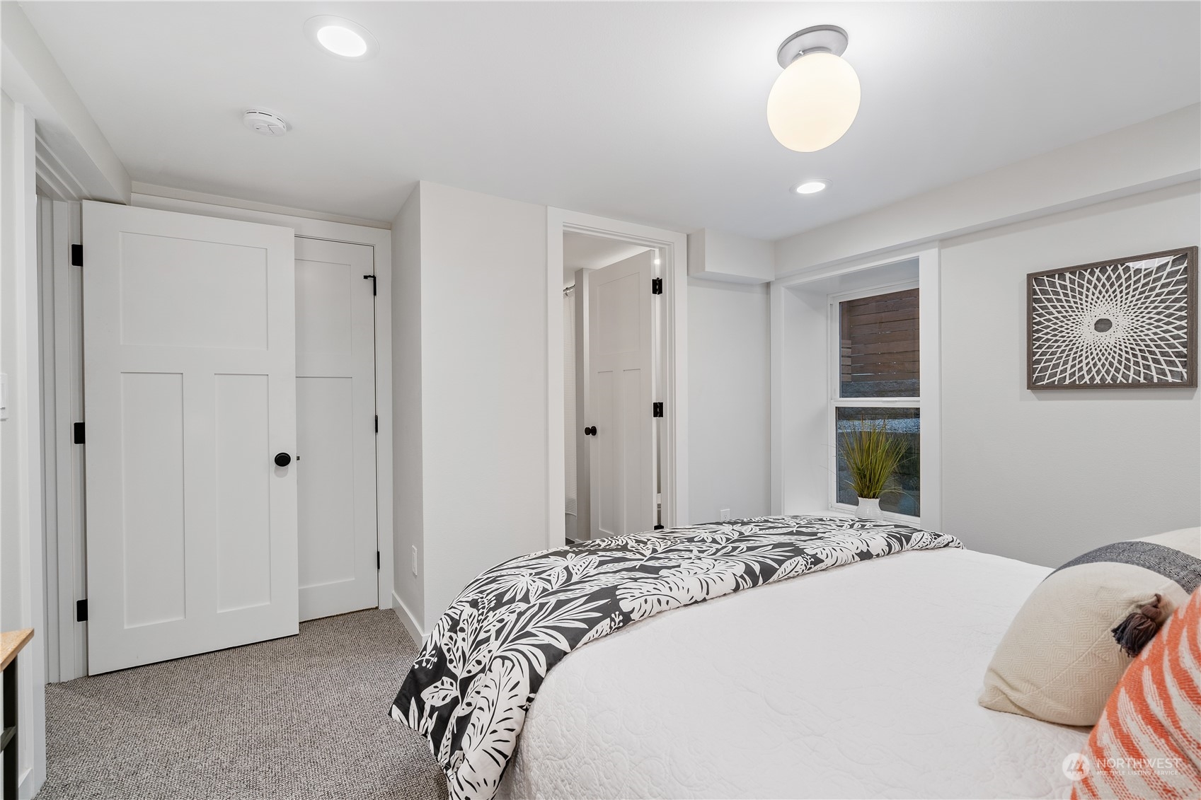 3541 Southwest 100th Street Seattle, WA 98146 - Photo 20 of 25 a bedroom with a bed and a window