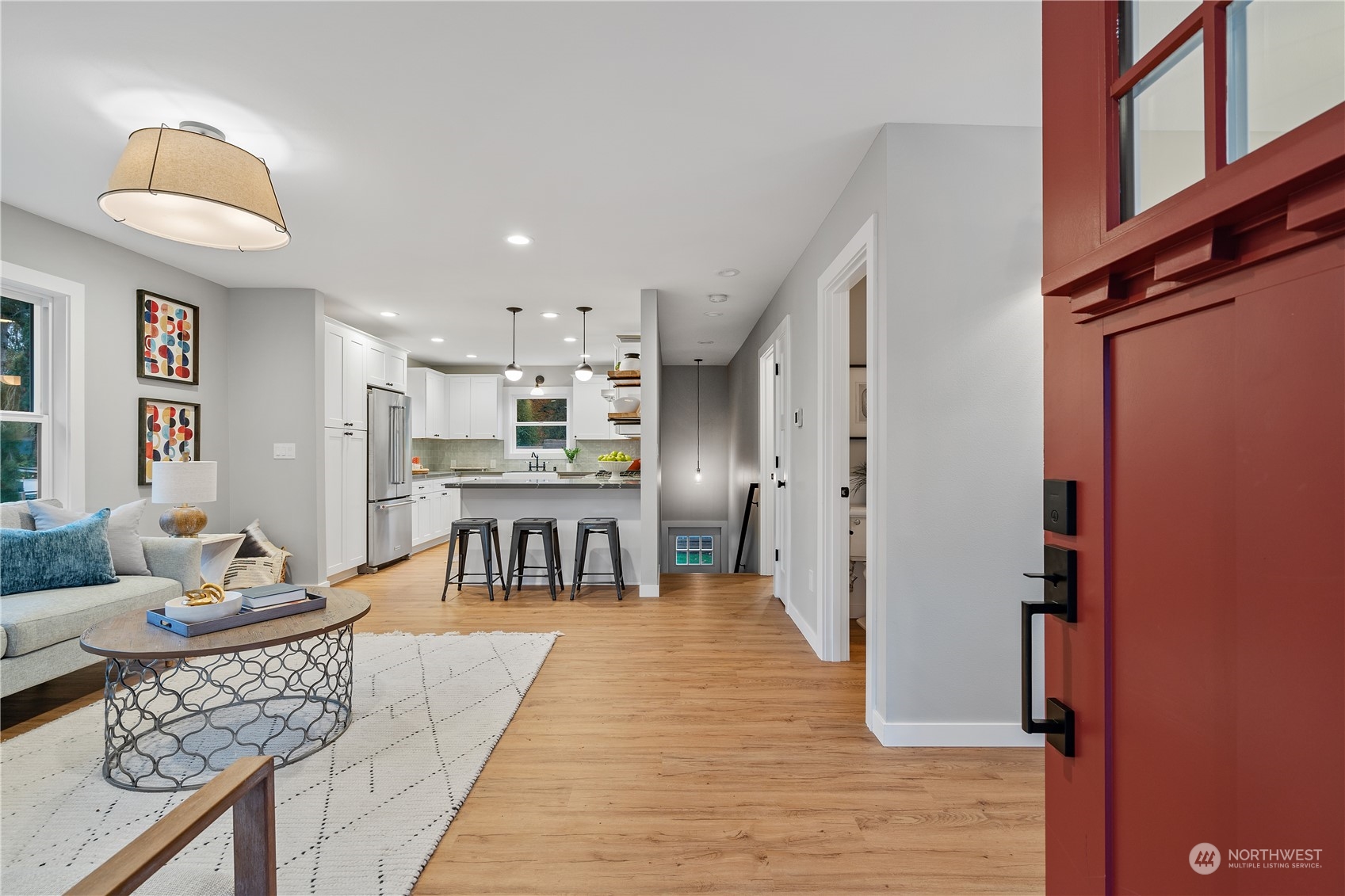 3541 Southwest 100th Street Seattle, WA 98146 - Photo 2 of 25 a living room with furniture and a table
