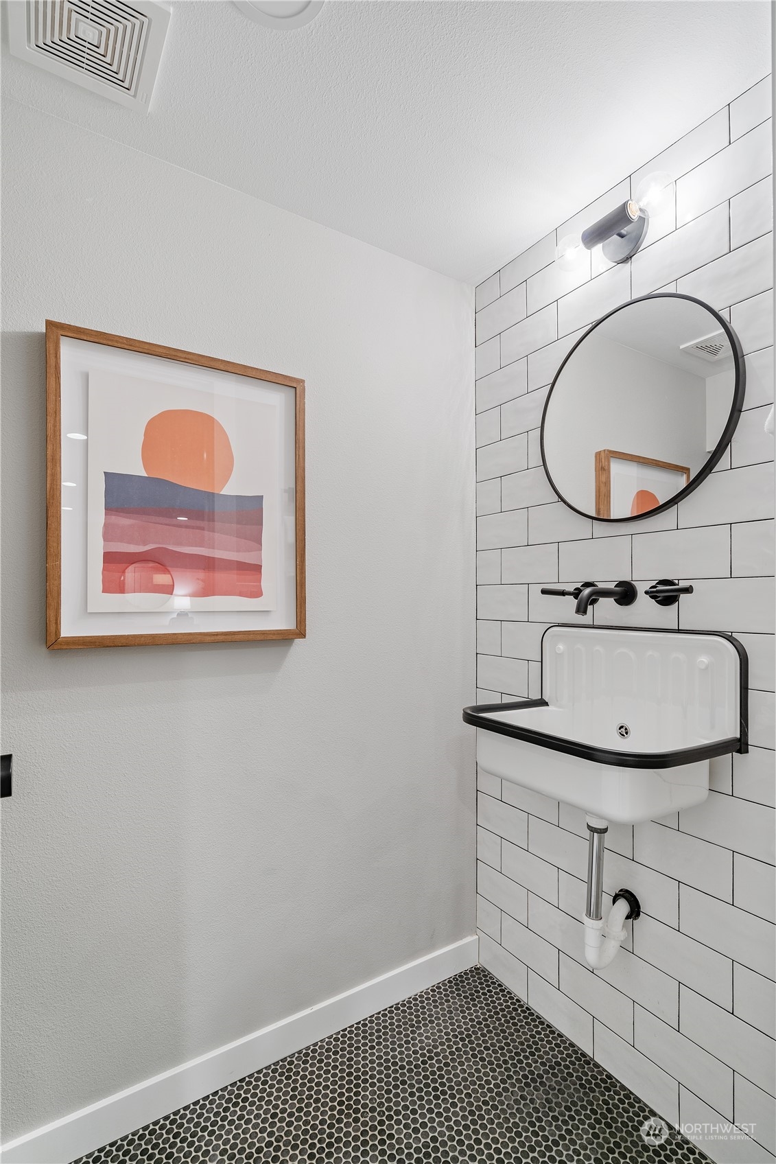 3541 Southwest 100th Street Seattle, WA 98146 - Photo 21 of 25 a bathroom with a sink and a mirror