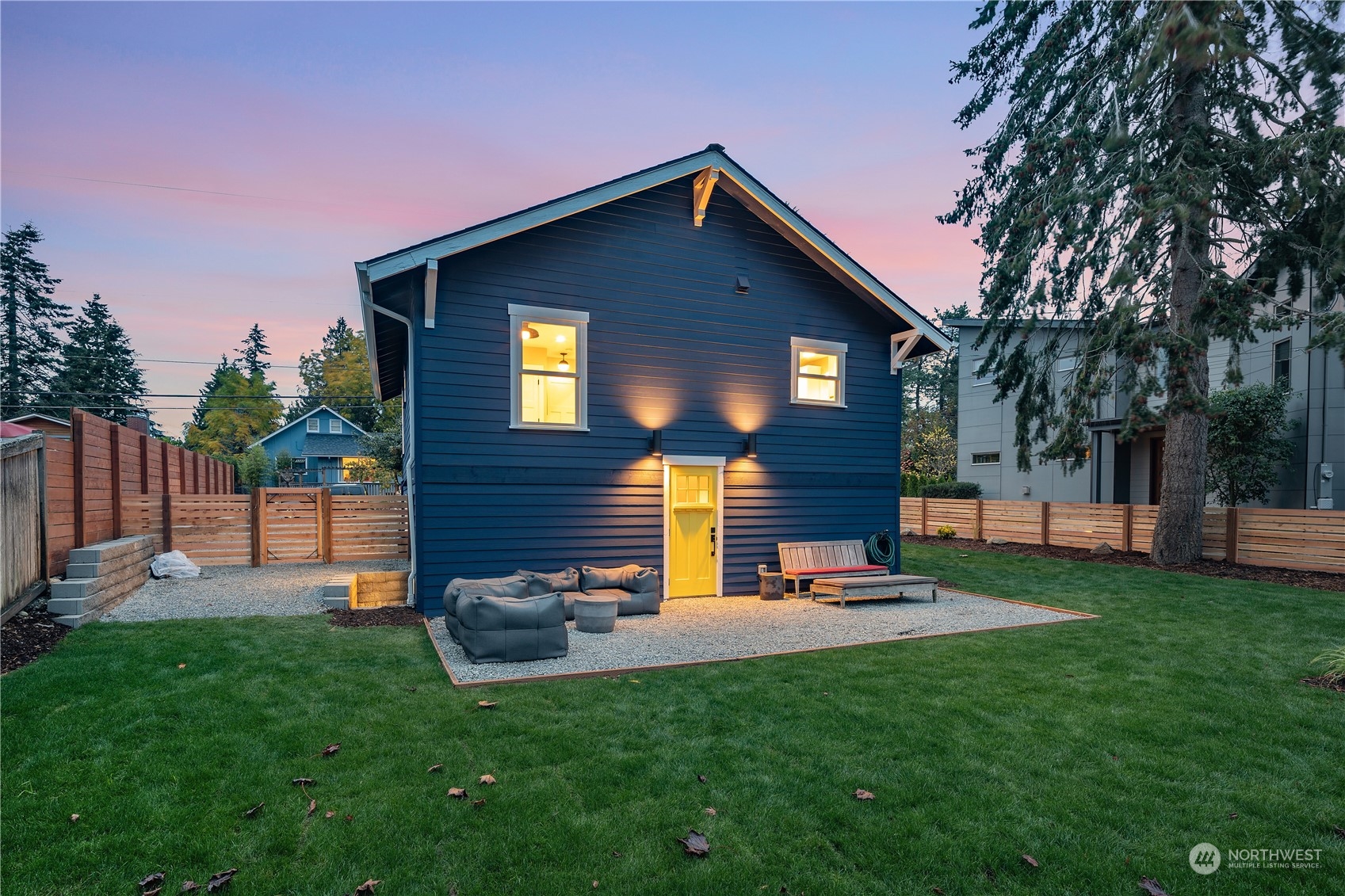 3541 Southwest 100th Street Seattle, WA 98146 - Photo 23 of 25 a backyard of a house with table and chairs
