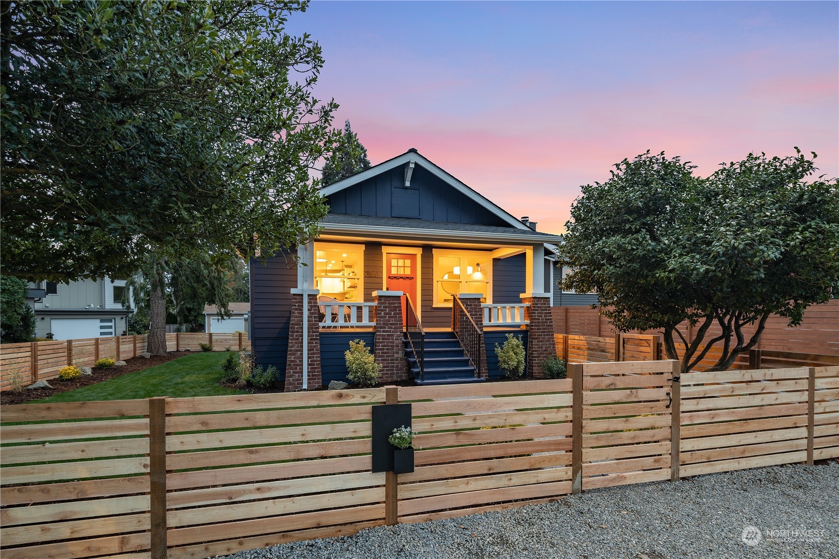 3541 Southwest 100th Street Seattle, WA 98146 - Photo 25 of 25 a front view of a house with a yard
