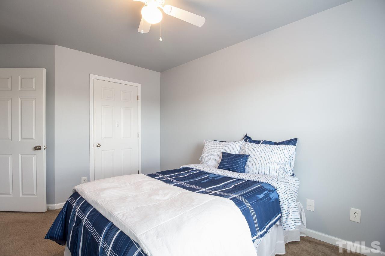 11701 Coppergate Drive, Unit 105 Raleigh, NC 27614 - Photo 15 of 25 Another view showing the ceiling fan and closet.