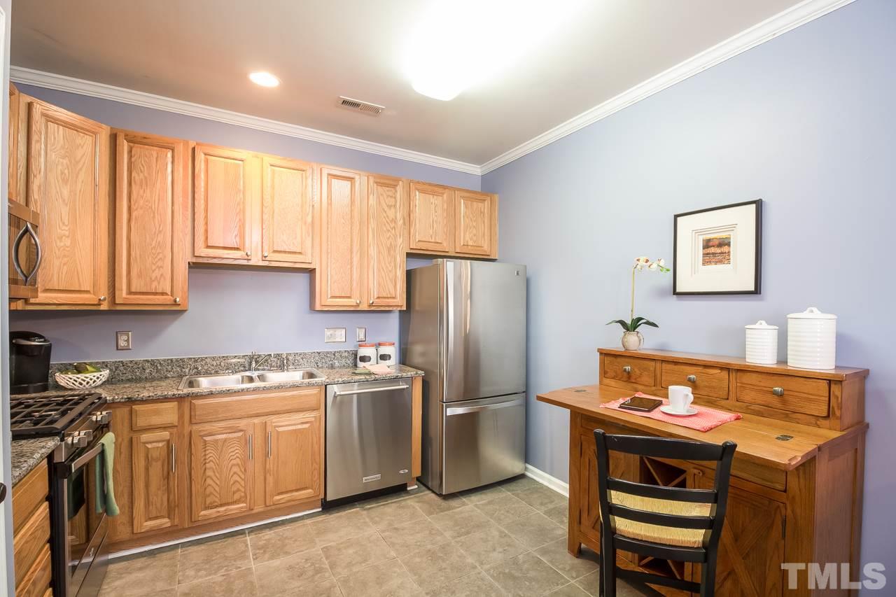11701 Coppergate Drive, Unit 105 Raleigh, NC 27614 - Photo 8 of 25 Open kitchen with space for a small table or breakfast bar area.