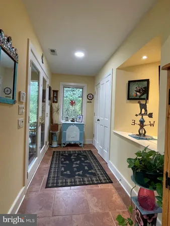 a room with furniture and a rug