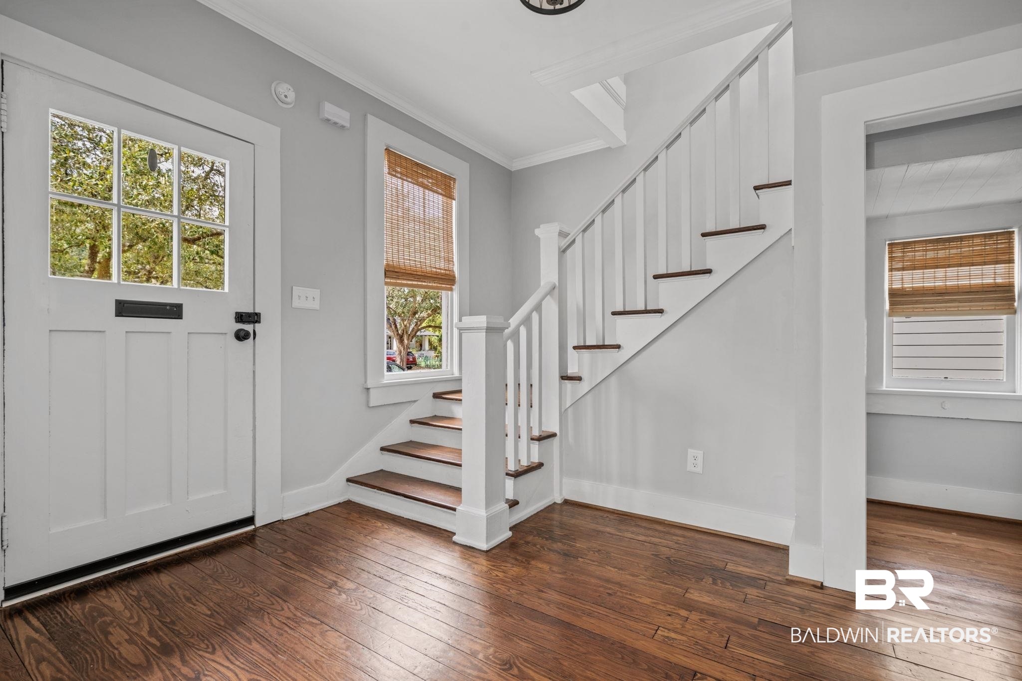 123 Macy Place Mobile, AL 36604 - Photo 5 of 35 Entryway featuring dark wood-style flooring and ornamental molding