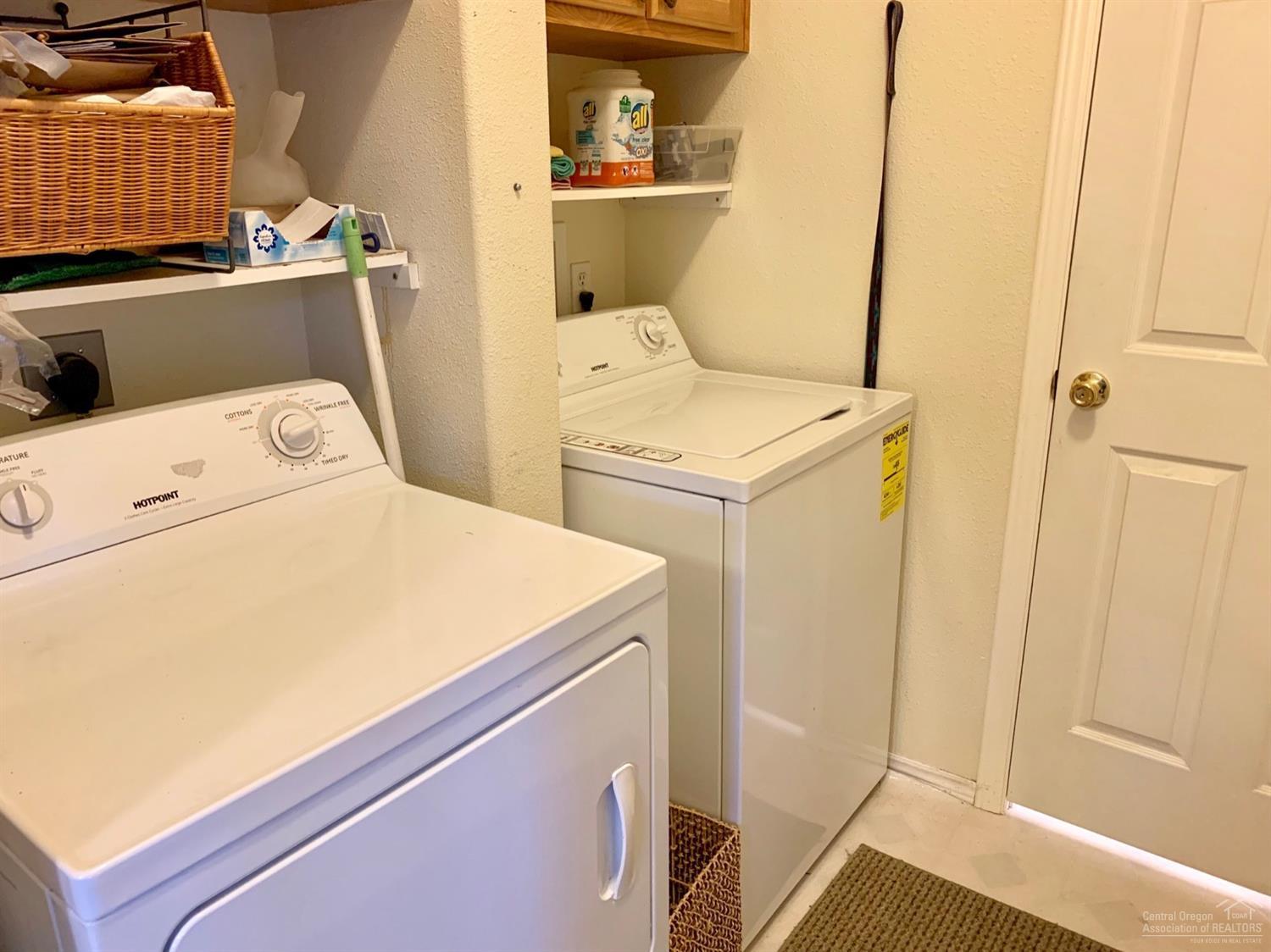 141 Southwest 15th Street, Unit 37 Bend, OR 97702 - Photo 15 of 23 Utility room with washer and dryer
