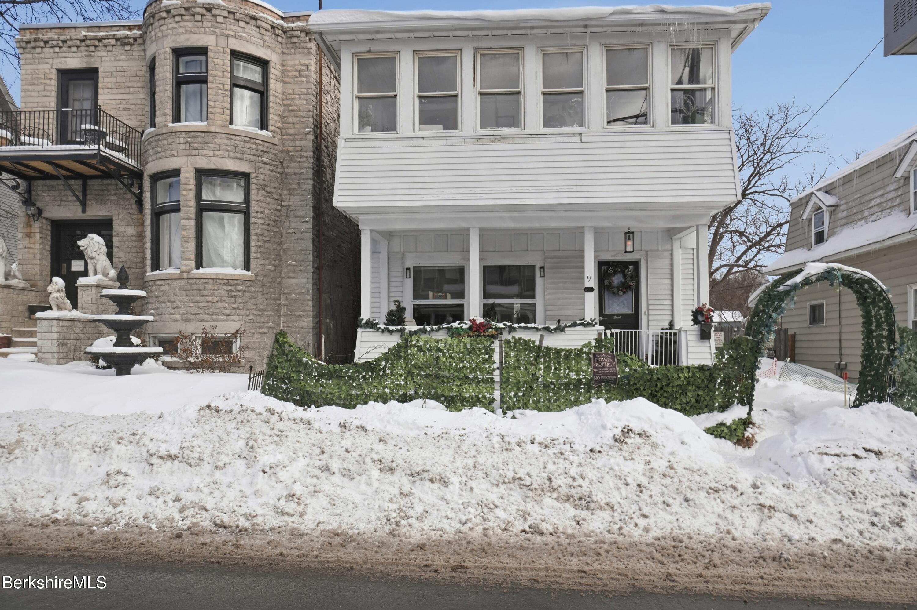 9 Lincoln Street Pittsfield, MA 01201 - Photo 3 of 44 a front view of a house with a yard