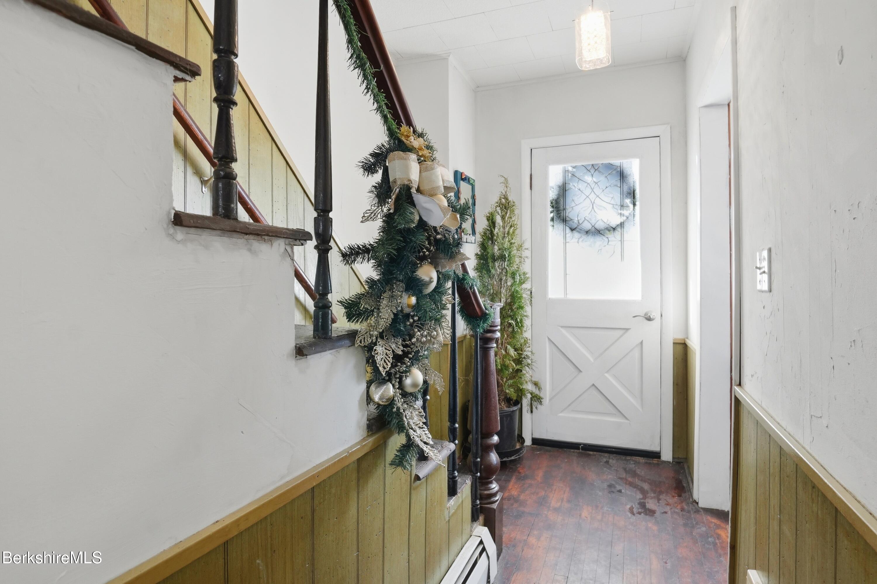 9 Lincoln Street Pittsfield, MA 01201 - Photo 5 of 44 a view of an entryway with wooden floor