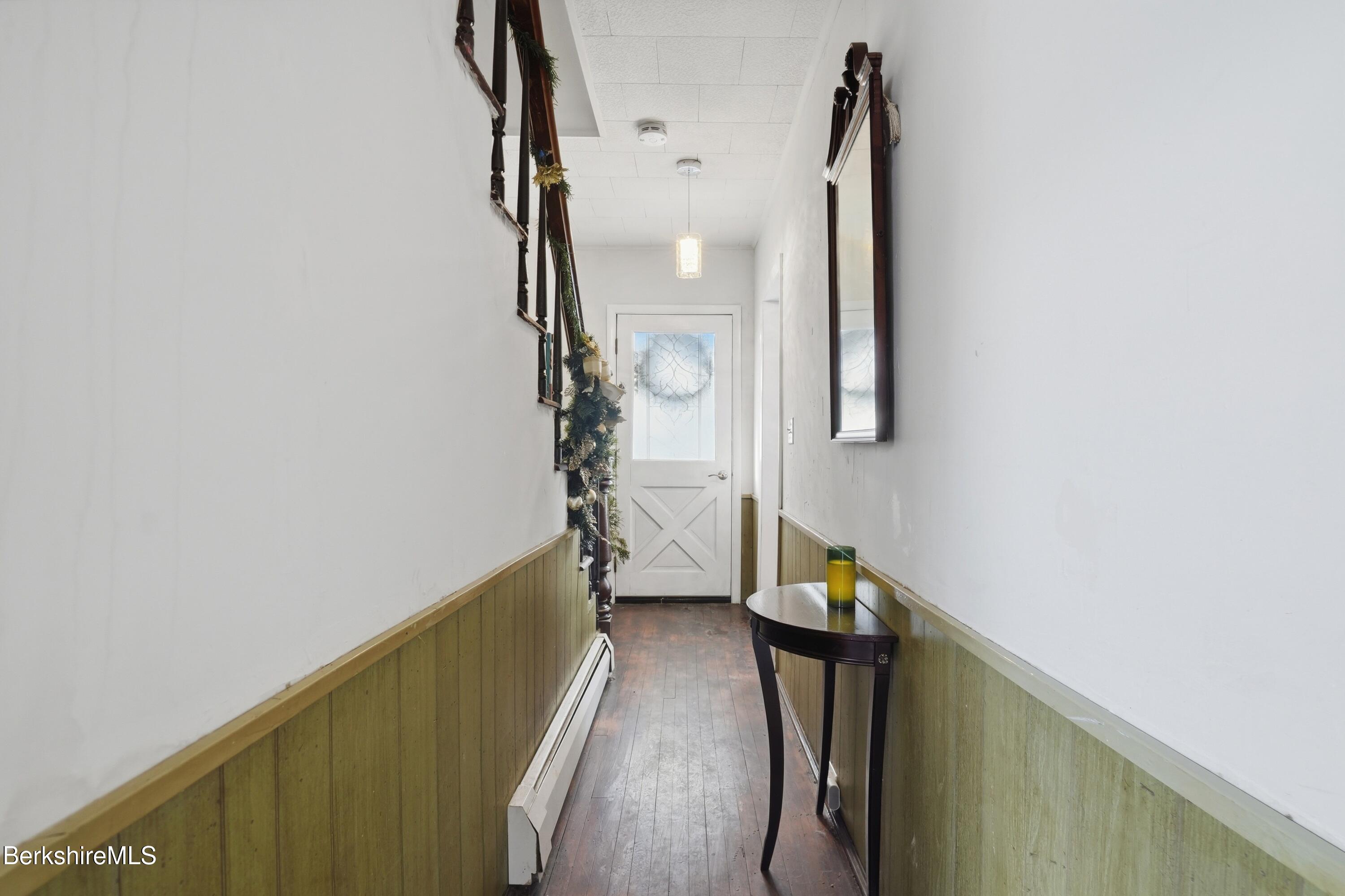 9 Lincoln Street Pittsfield, MA 01201 - Photo 6 of 44 a view of entryway and hall with wooden floor