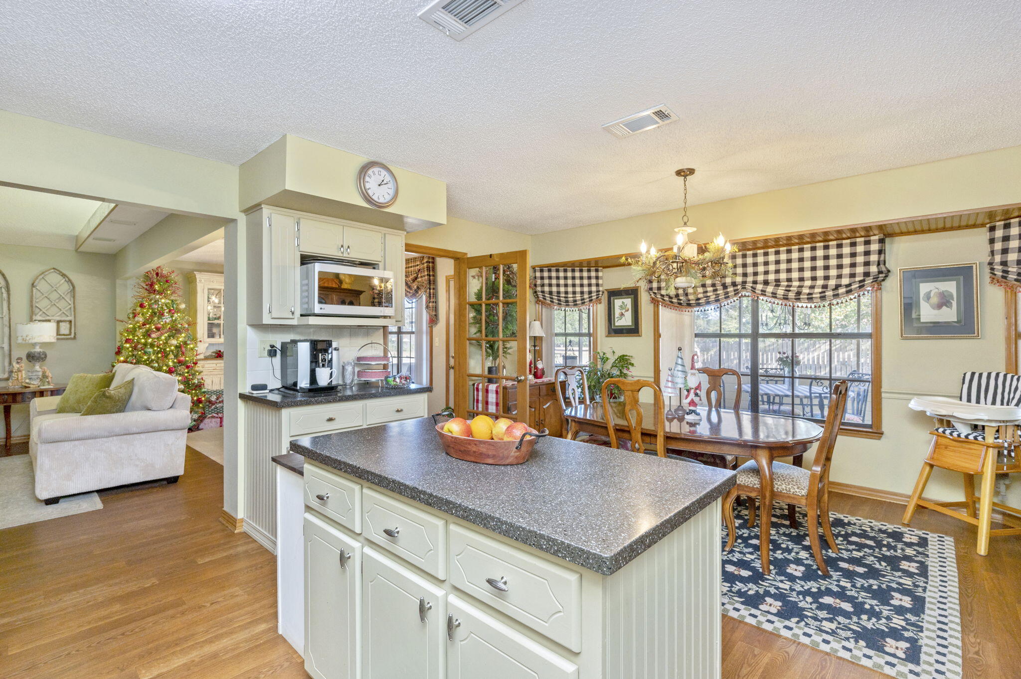 5811 Dairy Road Baker, FL 32531 - Photo 13 of 36 a view of a living room and kitchen with furniture