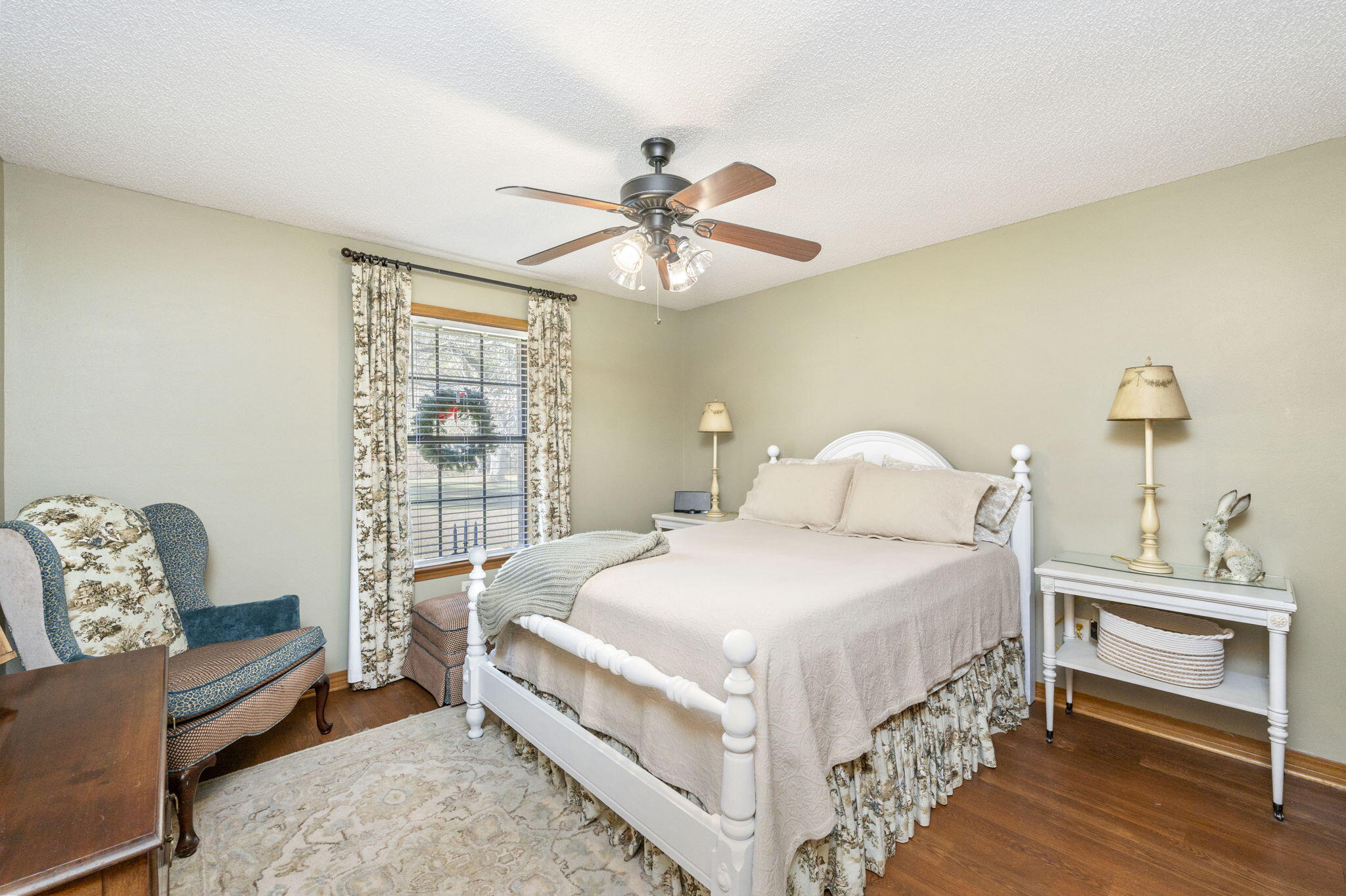 5811 Dairy Road Baker, FL 32531 - Photo 21 of 36 a bedroom with a bed and a chandelier