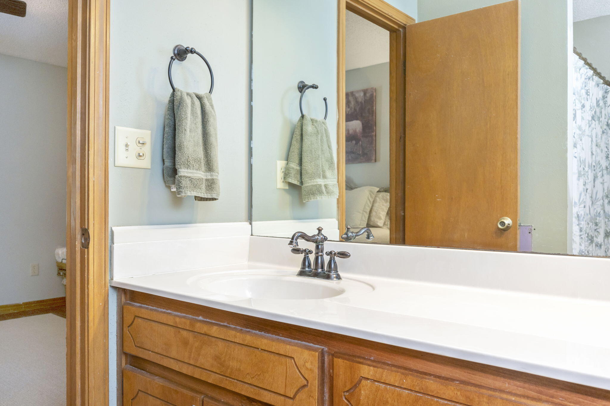 5811 Dairy Road Baker, FL 32531 - Photo 23 of 36 a bathroom with a sink and a mirror