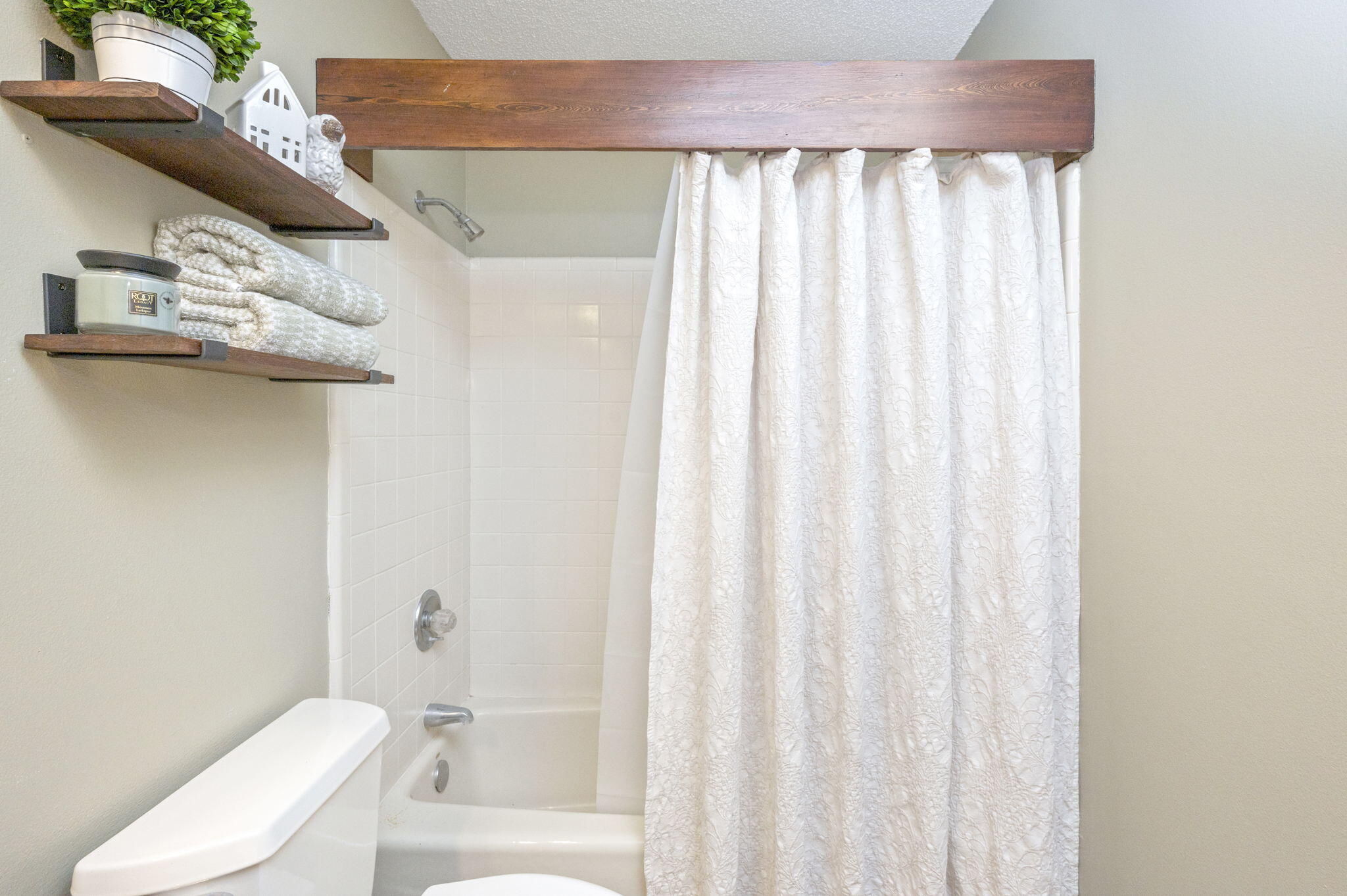 5811 Dairy Road Baker, FL 32531 - Photo 25 of 36 a bathroom with a toilet and a shower